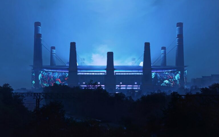 معماری عجیب یک استادیوم که توسط ۱۲ دودکش احاطه شده است